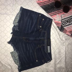Floral pocketed jean shorts